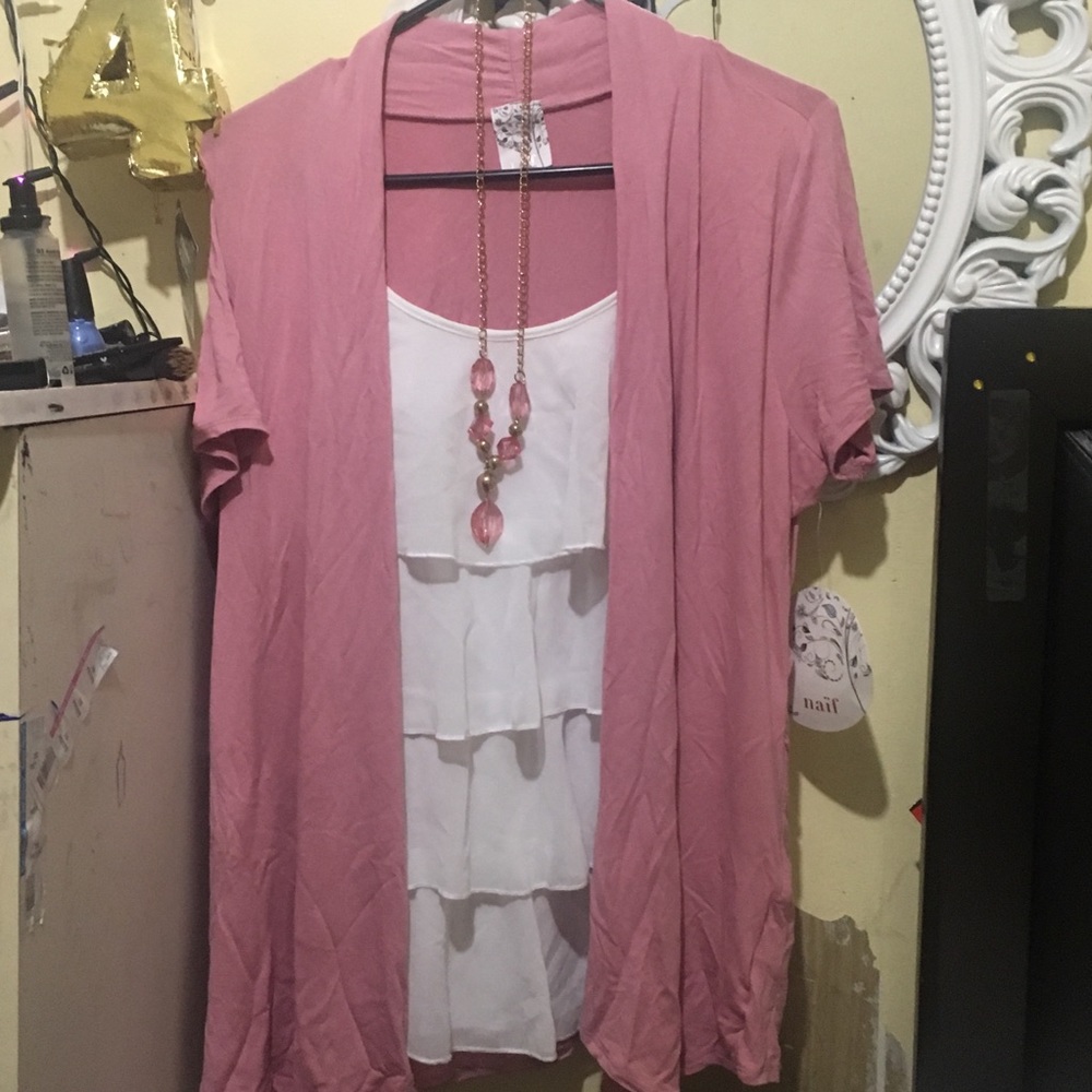 Pink Blouse with a Necklace